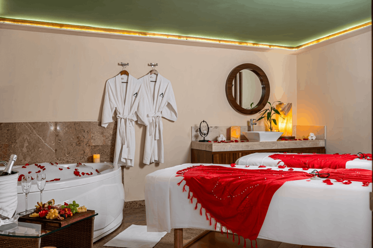 Romantic spa experience at Krystal Grand Los Cabos with couples treatment room, jacuzzi and special amenities.